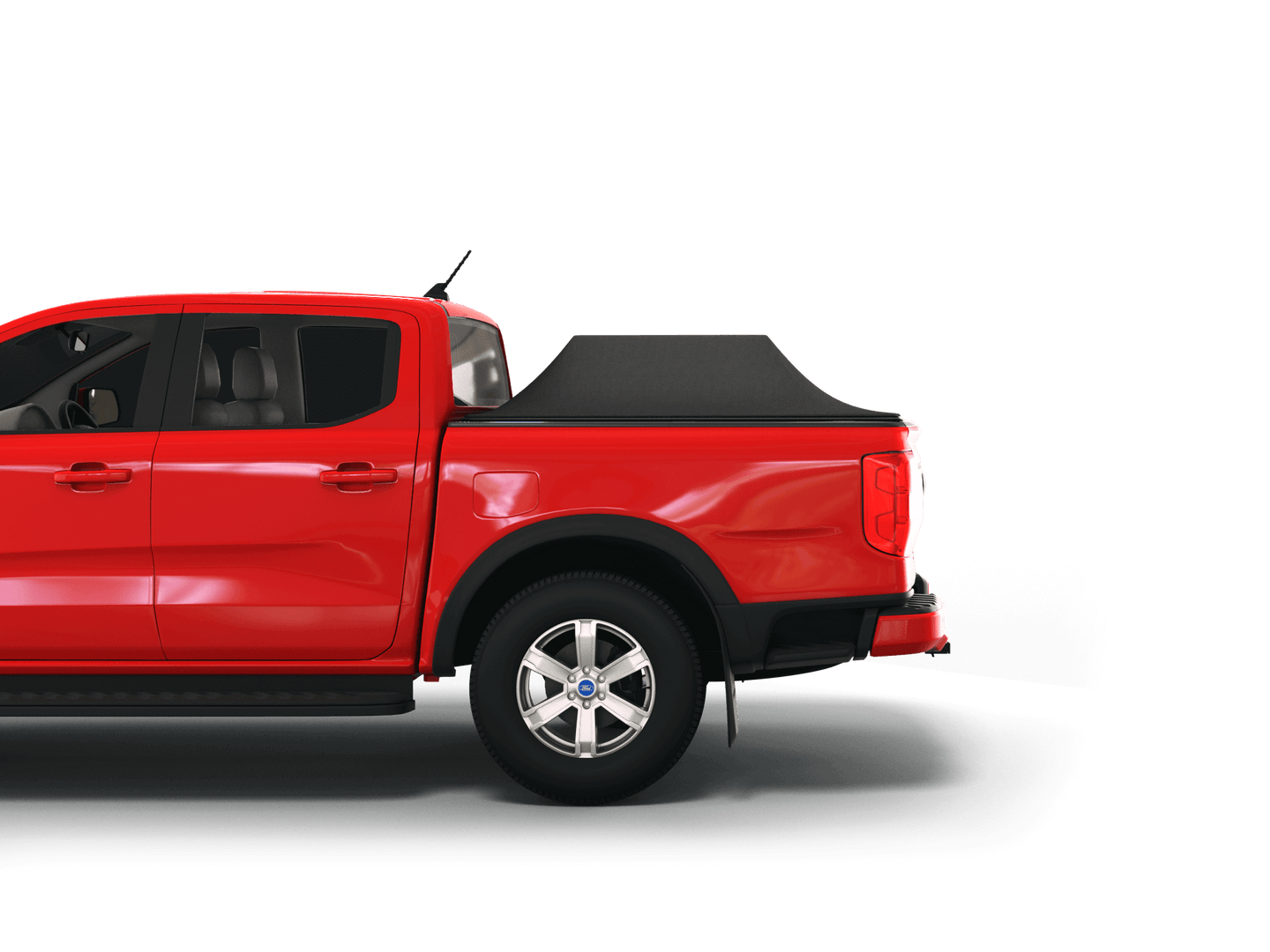 Red Ford Ranger with Sawtooth Stretch tonneau cover expanded over cargo load